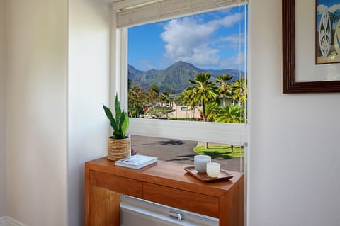 Wake up to breathtaking mountain views from the guest bedroom, the perfect way to start your day in paradise.