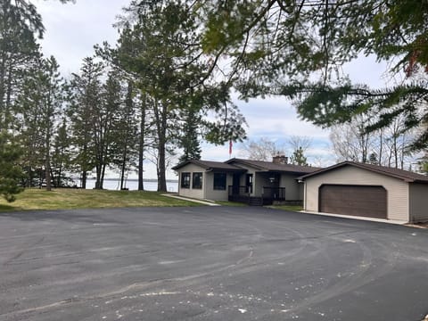 Spacious driveway for easy trailer maneuvering and space to store trailer.