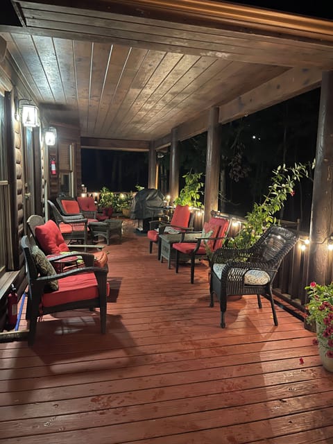 1st half of covered deck, Weber Gas grill and Thomas Edison lights at night!