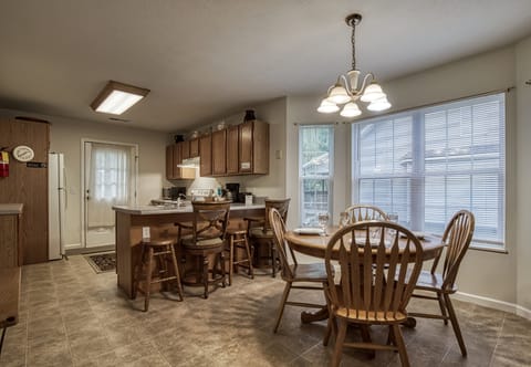 Pigeon Forge Budget Friendly Cottage "Henderson's Riverside" - Dining room and kitchen