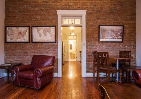 Living room looking into the kitchen. Come pin your hometown on our map!