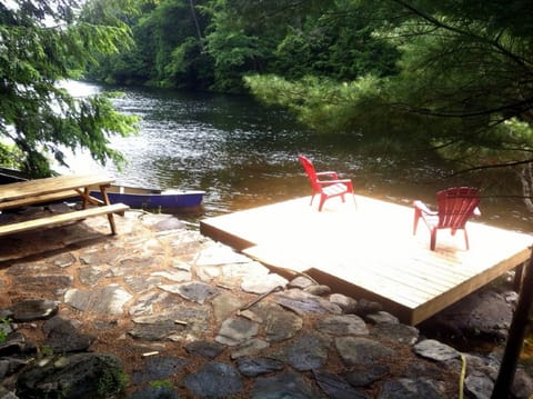 Riverside flagstone and cedar deck.