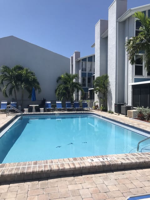 one of two heated pools, one building over