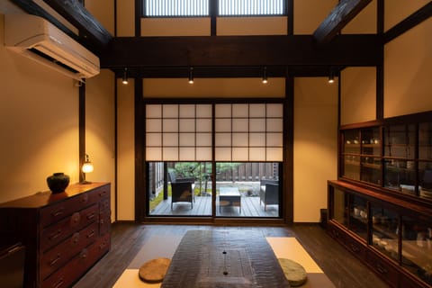 Deluxe Villa | Living room | 55-inch flat-screen TV with digital channels, TV, video-game console