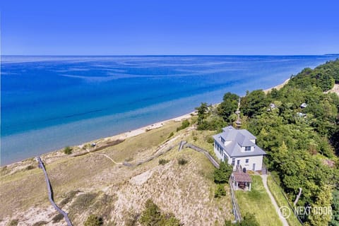 Unobstructed views of Lake Michigan and private beach