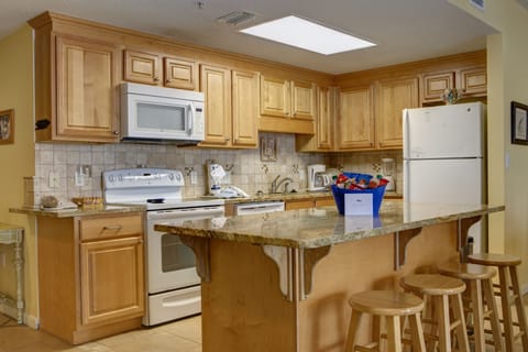 Open kitchen with large granite island
