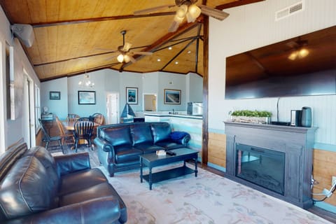 Relax in the living room and watch your favorite show in the big screen