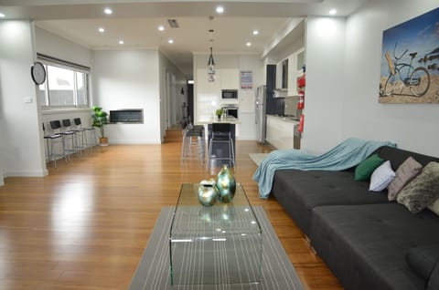 spacious lounge dinning room with gas heater