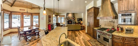 Amazing kitchen  wolf stove ,nook area looking out to back yard /golf course