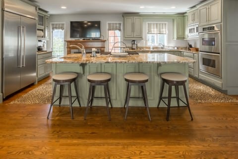 Kitchen area with barstool seating