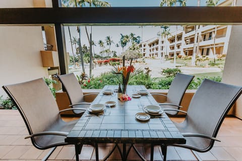 Outdoor dining on the lanai with easy access to the pool but still far enough away for privacy