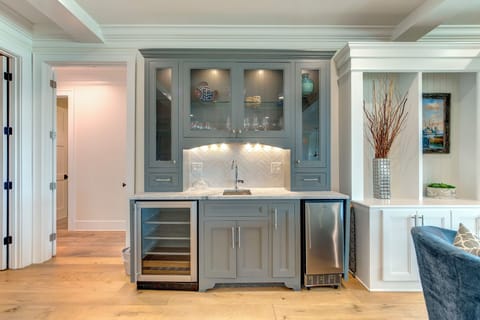 Wet bar with ice maker and wine cooler