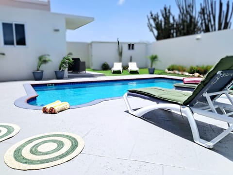 Our pool is a salt water pool
3.50m x 6.30m 
0.94cm shallow end
1.33cm deep end