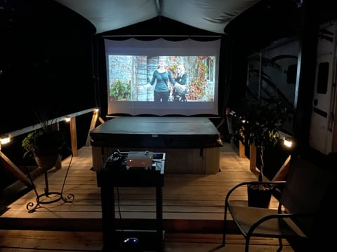 In the evenings relax with our new outdoor movie theater.