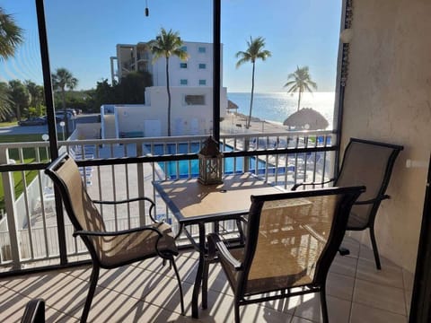 Enjoy captivating pool and ocean views from the comfort of your screened patio.