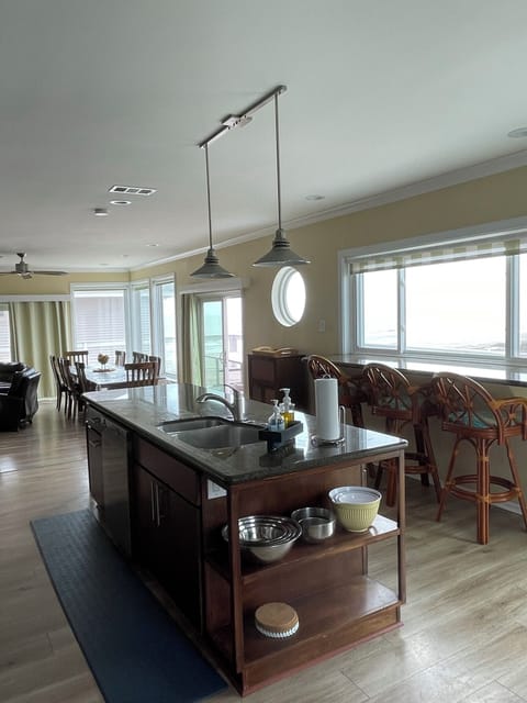 Kitchen flows into the dining/living area