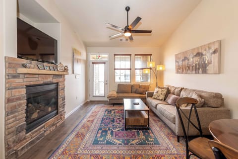 Relax in the comfy living room with cozy gas fireplace