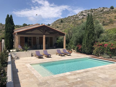 Secluded villa with private pool,  south  facing natural travertine terrace.