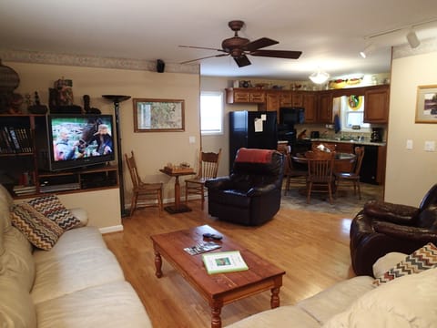 Comfortable open den and kitchen area.