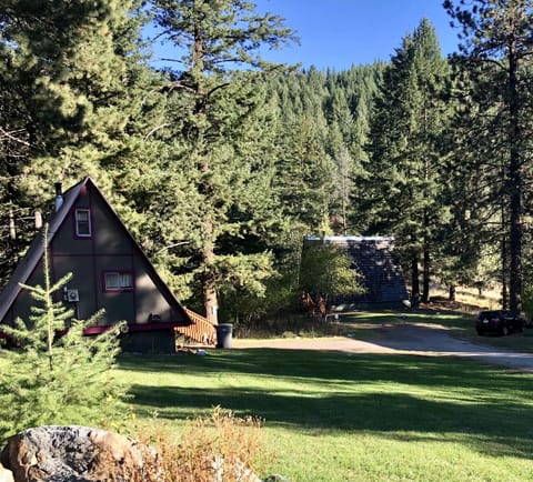 Beautiful mountain retreat on two acres of riverfront property.
