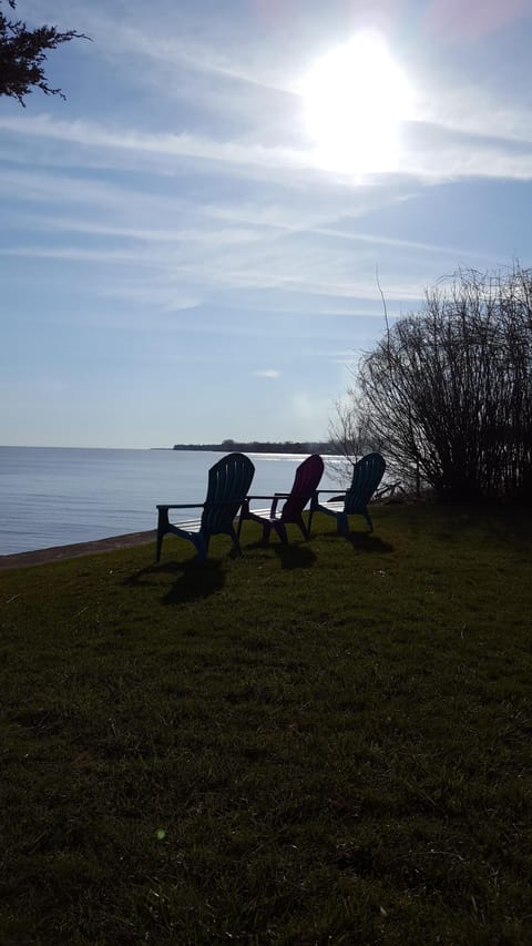 sit at waters edge at sunrise