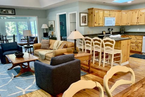 View from the dining room through the living room to the sunroom.