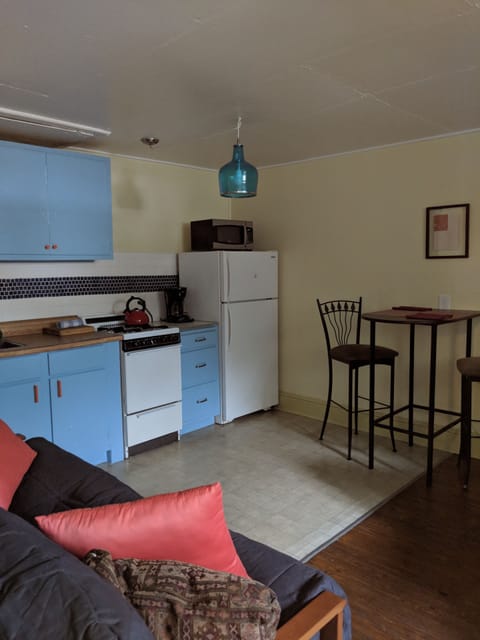 View of kitchen from bedroom entrance.