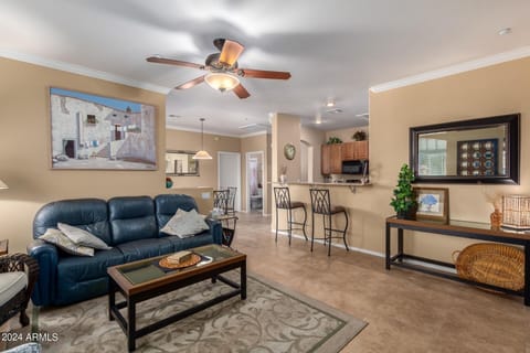 Living area with reclining couch.