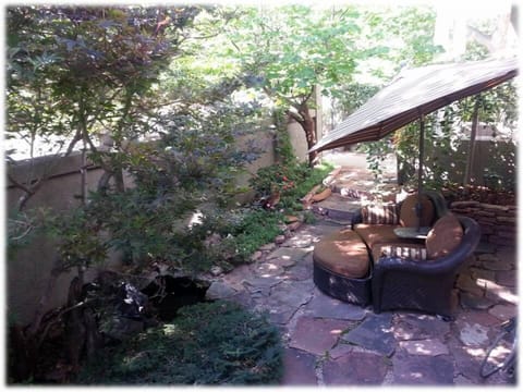 Outdoor sitting area with relaxing water feature
