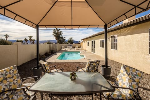Sit under a canopy during the day or night
Table for 6 people