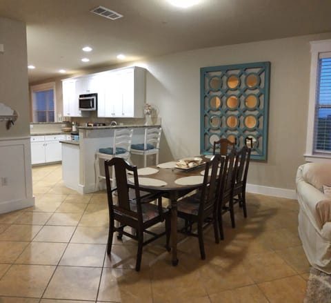 Dining room open to kitchen and living room.