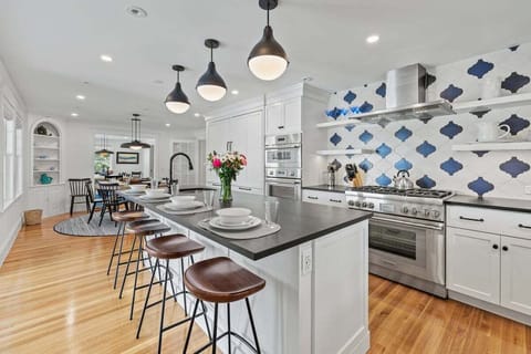 Island seating as well so you can watch the chef work their magic