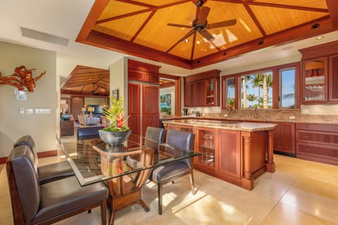 Prepare meals with ease in the chef’s kitchen complete with high-end appliances and island seating.