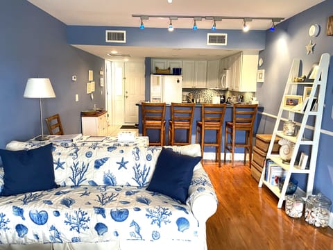 Open living room area and kitchen.