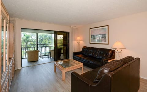 Natural light pours into the living room