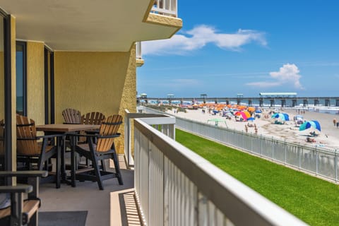 Welcome to Peaches and Cream, a 4-bedroom, 4-bathroom oceanfront condo overlooking Folly Beach