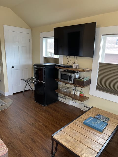 Small fridge with separate freezer, microwave and Smart TV