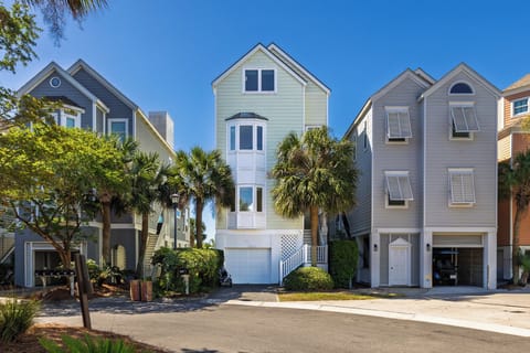 Welcome to Pavilion Paradise, a stunning 6-bedroom, 6-bathroom beachfront vacation home in the heart of Wild Dunes Resort