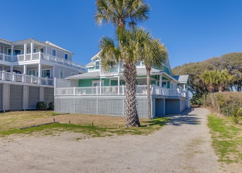 Classic beach house with palm trees, plenty of parking, and just steps from the sand