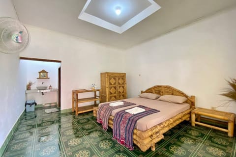 Standard Double Room with Fan | Desk, bed sheets