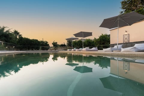Indoor pool, seasonal outdoor pool, pool umbrellas, sun loungers