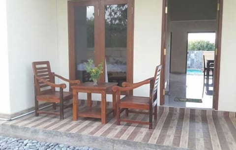 Back side sitting with ocean breeze.