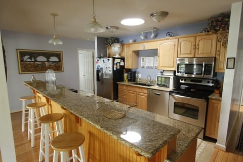 Kitchen - granite, stainless, cutlery, dishes for twenty,all cooking utensils.