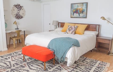 Master bedroom with king bed located on lower level
