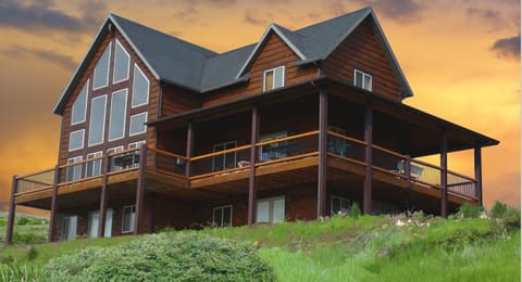 Cabin Exterior - Deck View. Cabin on Hill over looking the lake.
