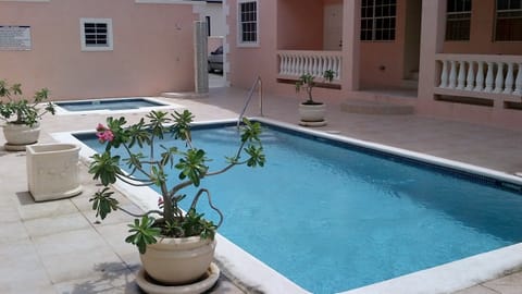 pool and whirlpool,  loungers are poolside
