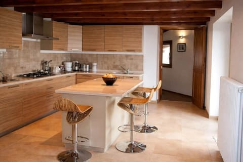 Start the day with coffee at the counter and end it lingering over shared bites. This kitchen feels effortless and inviting—a place where simple routines turn into relaxed moments and time slows without trying.