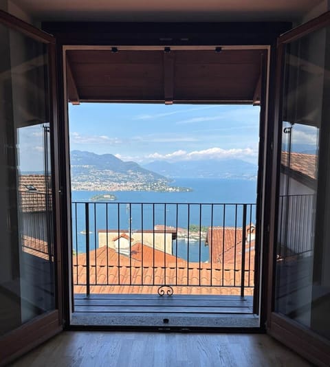 Open the doors and let the lake draw you in. Rooftops, water, and distant mountains come together in a moment that feels expansive and grounding, inviting quiet mornings, lingering pauses, and a deep sense of awe.