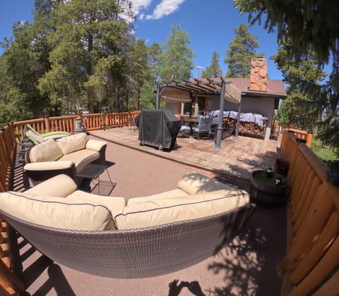 There's room for the whole group out on the spacious custom hand hewn log deck! 