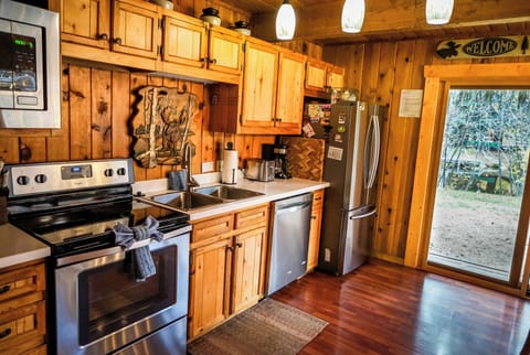 Beautiful kitchen that is amply stocked for your cooking needs. 